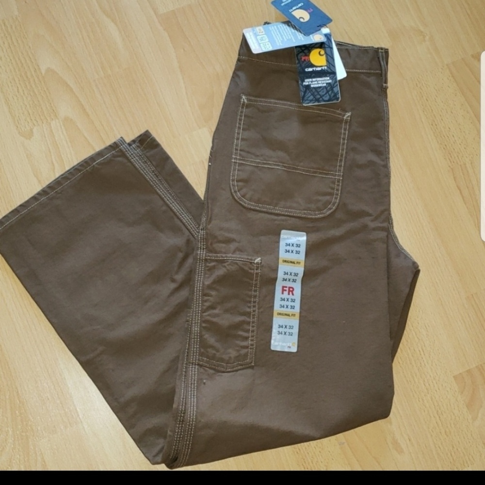Brand new Carhartt pants with tags on it